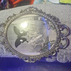 Ornate Silver Oval Frame with Butterfly Art
